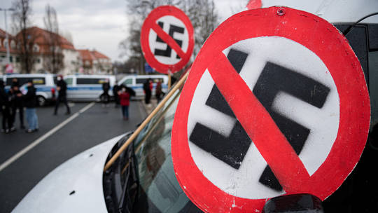 Putin vows to eradicate Nazism for good